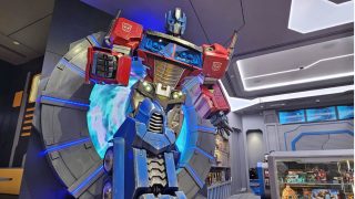 A LED Wall behind the Transformers figure